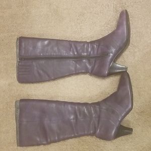 Size 9 1/2 Born Dark purple leather boot 2' heel. Used